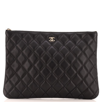 Chanel O Case Clutch Quilted Lambskin Medium