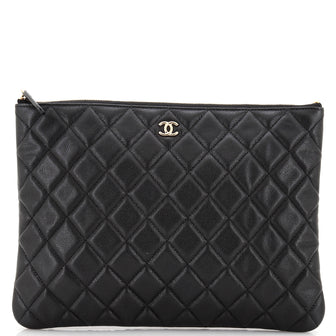 Chanel O Case Clutch Quilted Caviar Medium