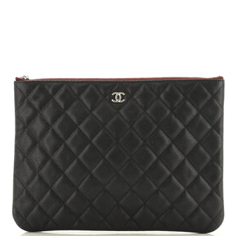 Chanel O Case Clutch Quilted Caviar Medium