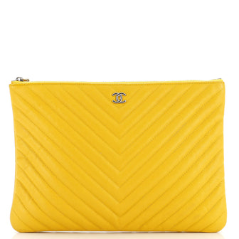 Chanel O Case Clutch Chevron Caviar Medium