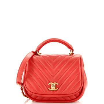 Chanel Reversed Round Flap Bag Chevron Lambskin Mini
