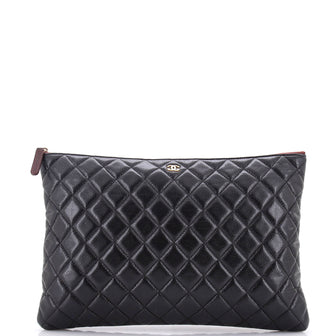 Chanel O Case Clutch Quilted Caviar Large