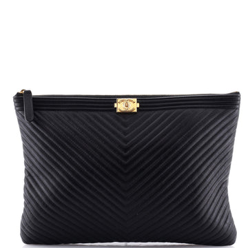 Chanel Boy O Case Clutch Chevron Calfskin Medium