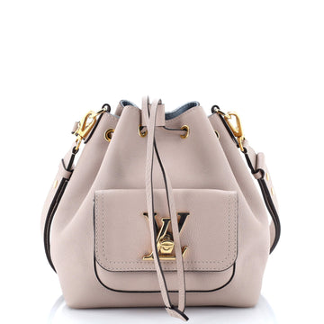 Louis Vuitton Lockme Pocket Bucket Bag Leather