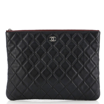 Chanel O Case Clutch Quilted Lambskin Medium