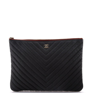 Chanel O Case Clutch Chevron Caviar Medium