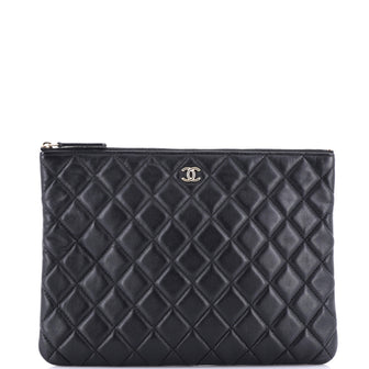 Chanel O Case Clutch Quilted Lambskin Medium
