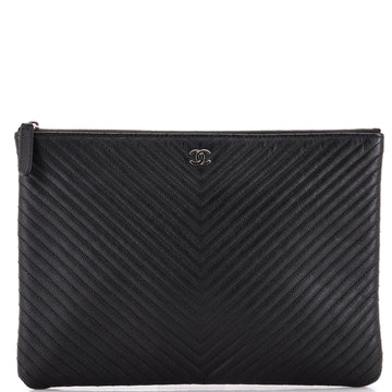 Chanel O Case Clutch Chevron Caviar Medium