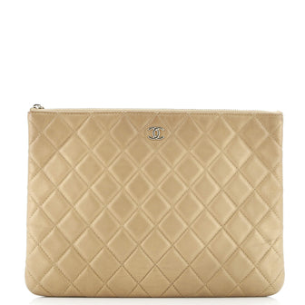 Chanel O Case Clutch Quilted Lambskin Medium