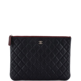 Chanel O Case Clutch Quilted Caviar Medium