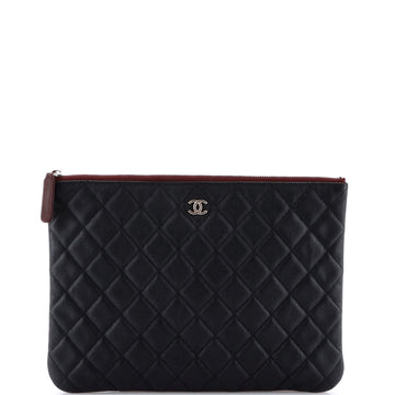 Chanel O Case Clutch Quilted Caviar Medium