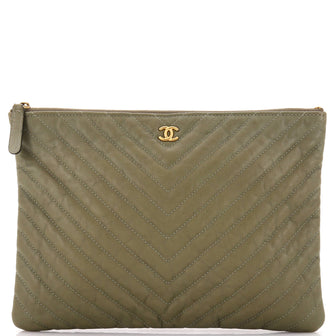Chanel O Case Clutch Chevron Lambskin Medium