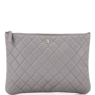Chanel O Case Clutch Quilted Caviar Medium