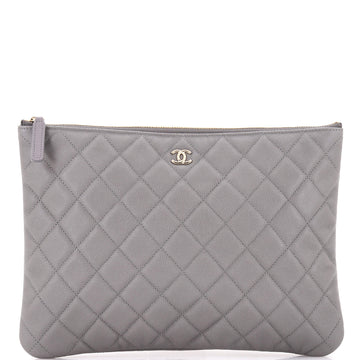 Chanel O Case Clutch Quilted Caviar Medium