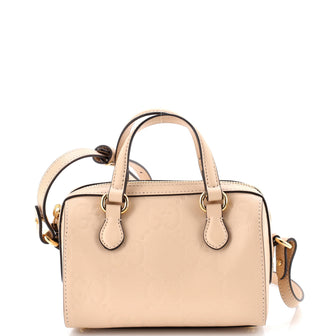 Gucci Convertible Top Handle Bag Jumbo GG Embossed Leather Mini