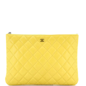 Chanel O Case Clutch Quilted Lambskin Medium