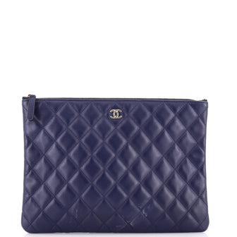 Chanel O Case Clutch Quilted Lambskin Medium