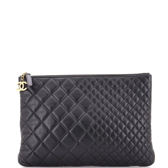 Chanel O Case Clutch Quilted Lambskin Medium