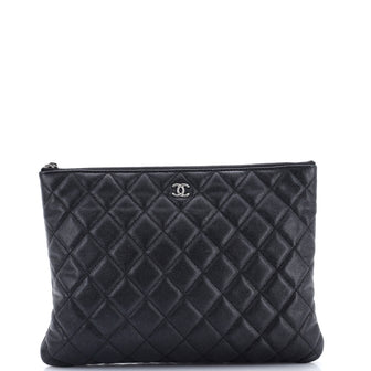 Chanel O Case Clutch Quilted Caviar Medium