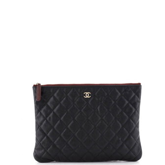 Chanel O Case Clutch Quilted Caviar Medium
