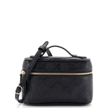Gucci Emblem Top Handle Vanity Bag GG Embossed Leather Small