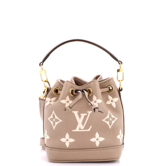 Louis Vuitton Noe NM Handbag Bicolor Monogram Empreinte Leather Nano