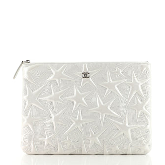 Chanel O Case Clutch Star Embossed Lambskin Medium