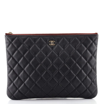 Chanel O Case Clutch Quilted Caviar Medium