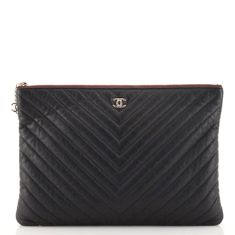 Chanel O Case Clutch Chevron Lambskin Medium
