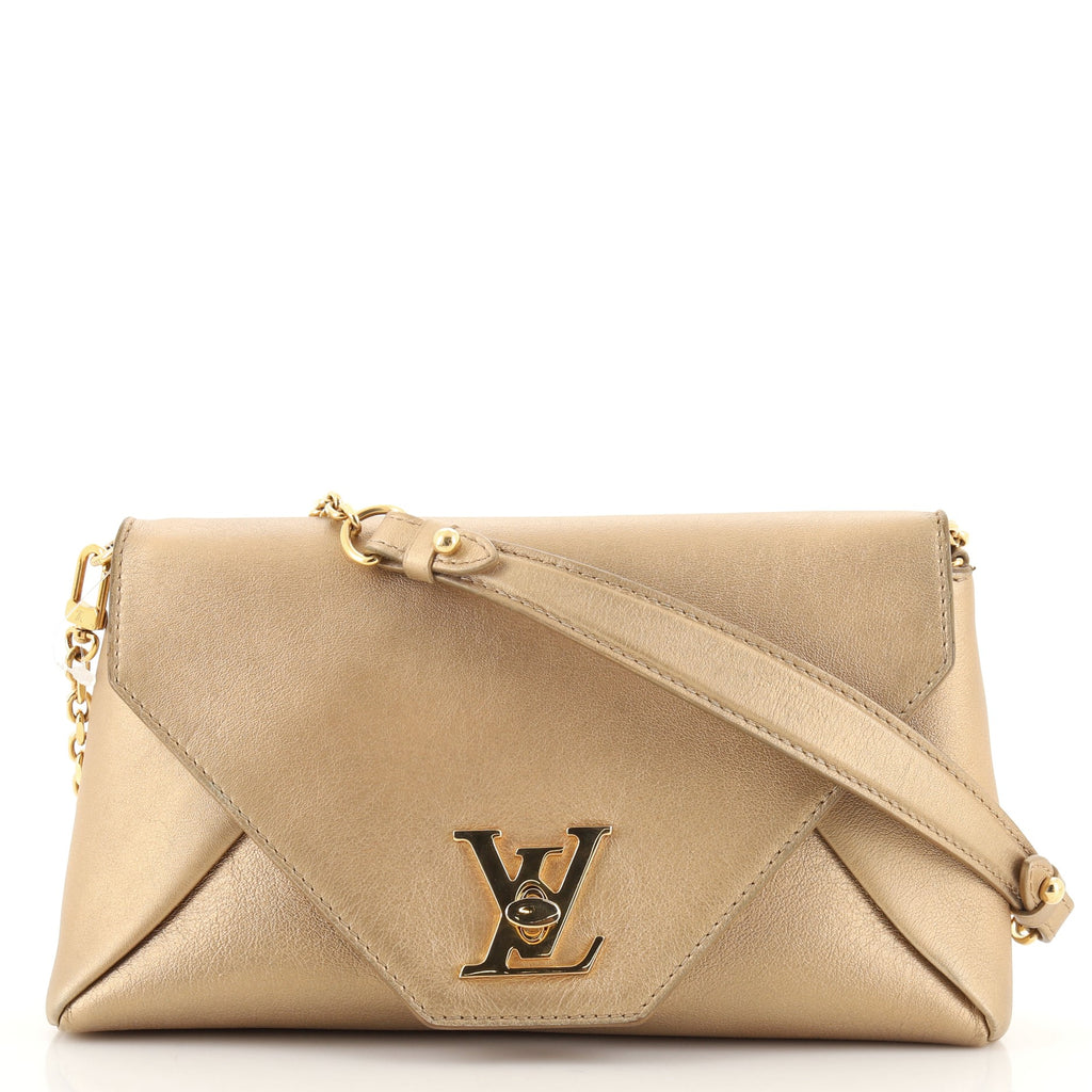 Live note Gold /Bronze Louis Vuitton bag/clutch