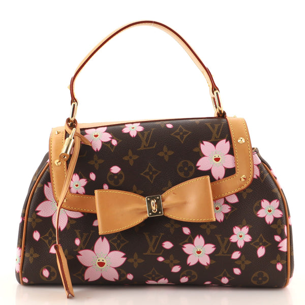 LOT:241  LOUIS VUITTON - a Limited Edition Takashi Murakami Brown Mini  Monogram Satin Cherry Blossom Griotte handbag.