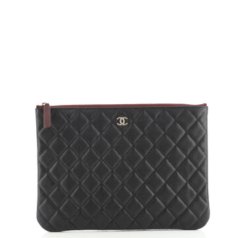Chanel O Case Clutch Quilted Caviar Medium