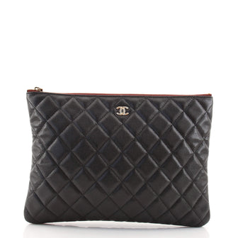 Chanel O Case Clutch Quilted Caviar Medium