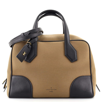 Louis Vuitton Dora Soft Handbag Canvas MM