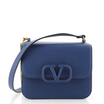 Valentino Garavani VSLING bag. Small textured leather shoulder bag. 