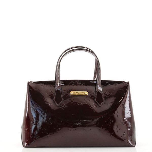 Wilshire PM Top handle bag in Monogram Vernis leather, Gold Hardware