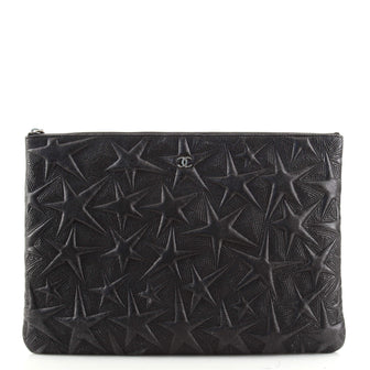 Chanel O Case Clutch Star Embossed Lambskin Large