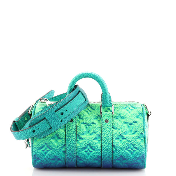 LV Keepall XS Taurillon Illusion Blue/Green available online at
