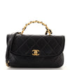 Chanel CC Back Muff Flap Bag Quilted Lambskin and Shearling Large Black  20658811