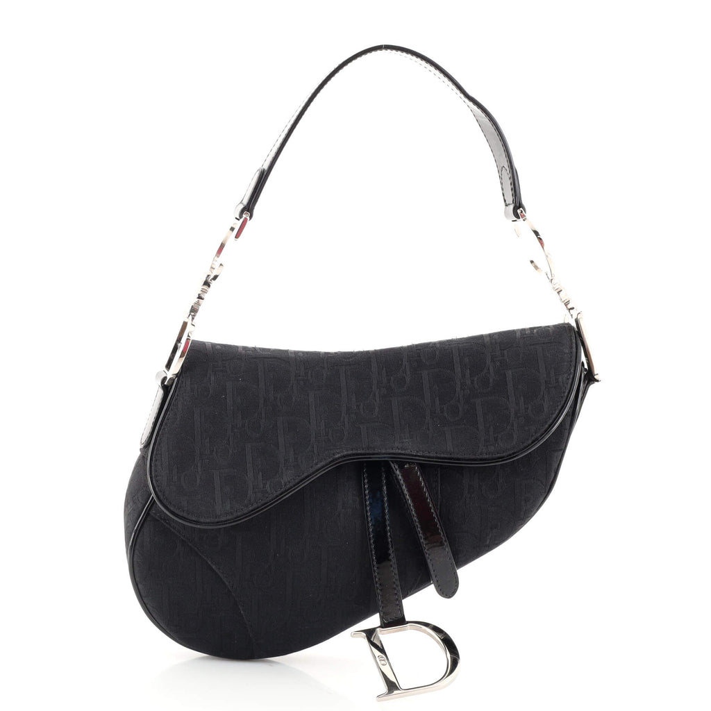 Elegance Redefined: Christian Dior Diorissimo Saddle Bag at Dress Raleigh