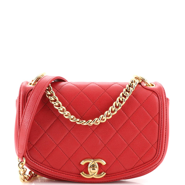 CHANEL. Red grained calfskin soft flap bag, red fabric i…