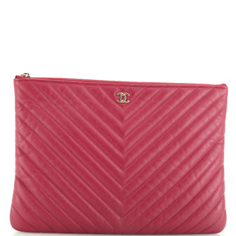Chanel O Case Clutch Chevron Lambskin Medium