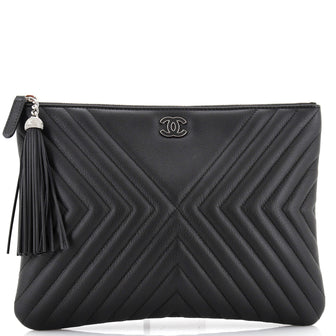 Chanel CC Tassel O Case Clutch Diagonal Chevron Calfskin Medium
