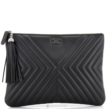 Chanel CC Tassel O Case Clutch Diagonal Chevron Calfskin Medium