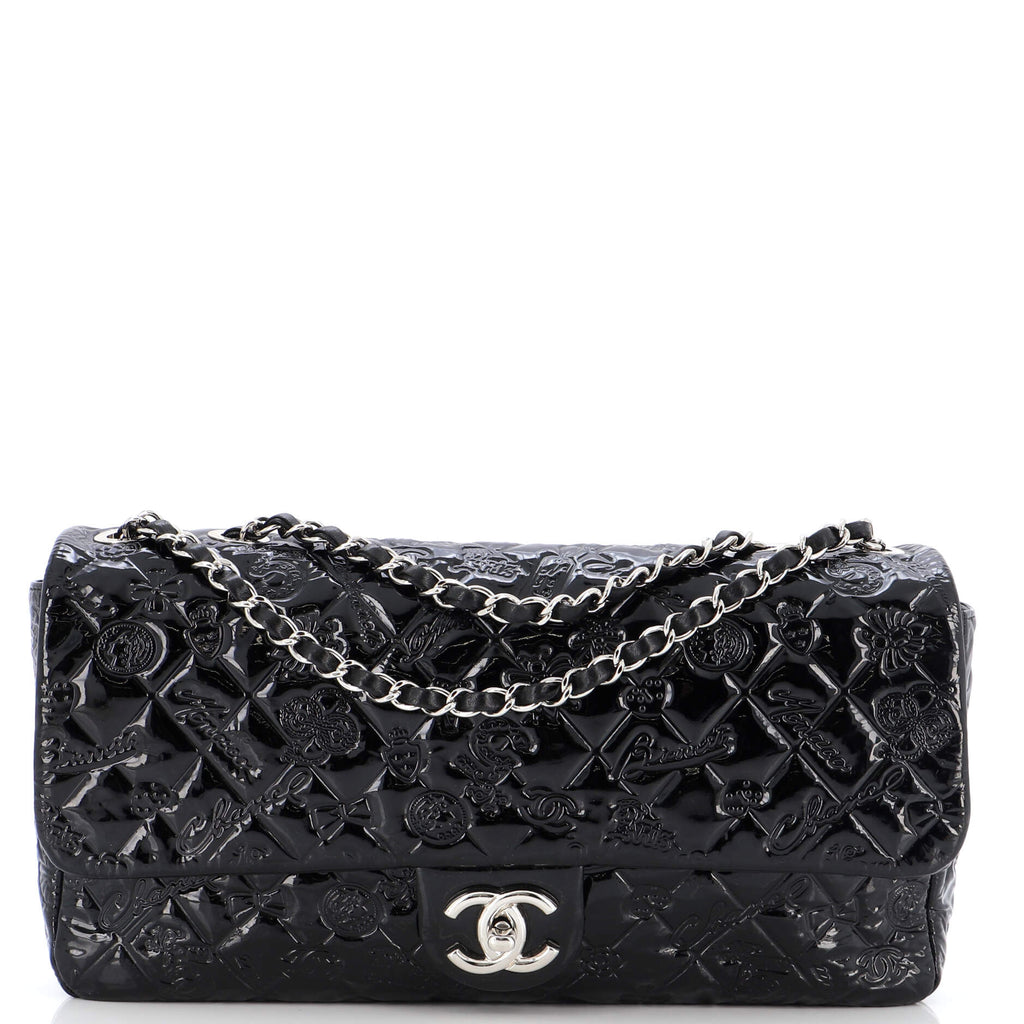 Authentic Chanel Embossed Lucky Charms Flap Bag In Black, Luxury