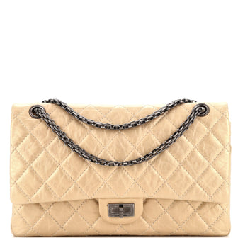 Chanel Beige Iridescent Caviar 2.55 Reissue 226 Double Flap Bag – Dina C's  Fab and Funky Consignment Boutique