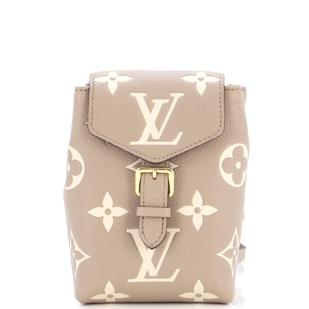 Louis Vuitton Tiny Backpack. Bicolour monogram empreinte, gradated canvas.  