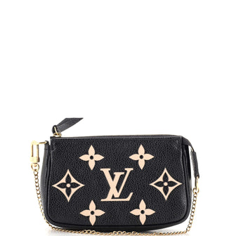 Louis Vuitton Black Monogram Empreinte Leather Mini Pochette Accessoires Louis  Vuitton
