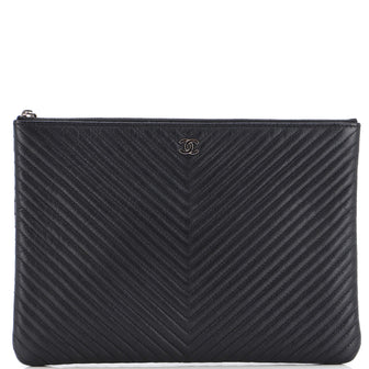 Chanel O Case Clutch Chevron Caviar Medium