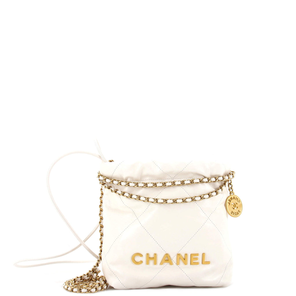 chanel white quilted handbag leather